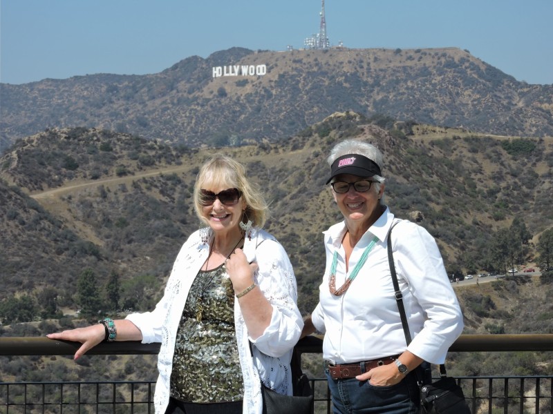 Carol and Donna under the Hollywood sign before reaching their final destination