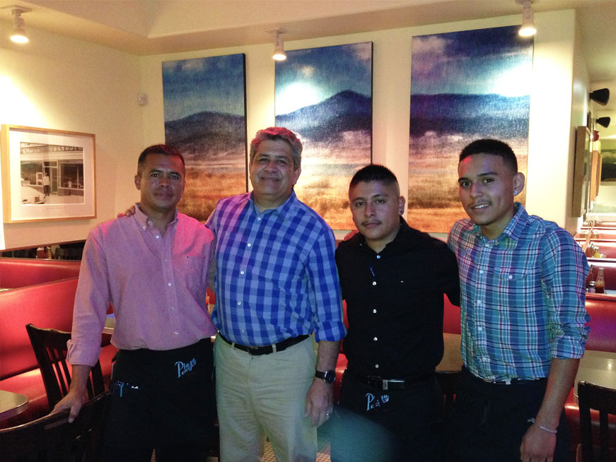 Daniel Razatos (2nd from left) and his staff